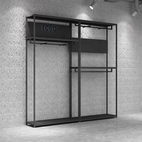 Porte-vêtements mural modulaire en métal noir et or de luxe pour boutique de robes de mariée et magasin de détail