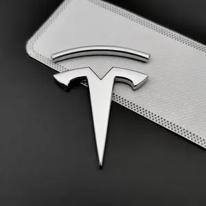 Adecuado para accesorios de coche Tesla, pegatinas de fibra de carbono para coche, modificación de logotipo de cubo de volante delantero y trasero