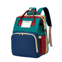 Portable Double épaule multi-fonctionnel voyage sac à dos maternité poussette sangles avec imprimé bébé nid lit nouveau-né momie sac