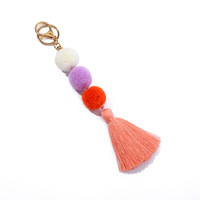 Porte-clés en peluche douce et durable arc-en-ciel coloré avec pompon, design de dessin animé tendance, porte-clés décoratif unisexe