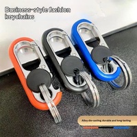 Porte-clés décontracté bicolore pour homme, créatif, double anneau en alliage de zinc et acier inoxydable, forme ovale, pour clés de voiture et motos