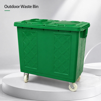 Conteneur à déchets extérieur commercial de 600 L en acier galvanisé vert avec 4 roulettes pivotantes