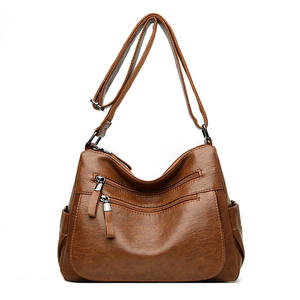 Sac à main de luxe pour femmes en cuir PU imperméable et souple de marque célèbre avec fermeture à glissière - Product Image 1