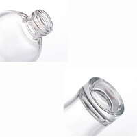 Flacon compte-gouttes en verre à base épaisse avec bouton poussoir 30ml 50ml, emballage de luxe pour sérum et huile essentielle avec boîte en papier