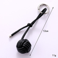 Porte-clés minimalistes en corde tressée avec nœud poing de singe, breloques de sac colorées en forme de boule, porte-clés en cuir PU de couleur unie pour femmes