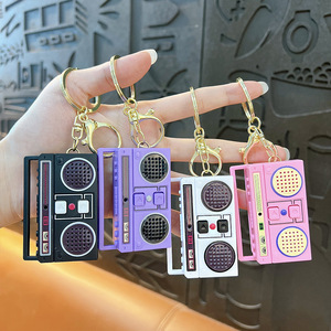 Mini Phim Hoạt Hình <span class=keywords><strong>PVC</strong></span> Nhựa Keychain Ghi Sáng Tạo Mặt Dây Chuyền Quà Tặng Cho Các Trường Học Túi Hoặc Các Cặp Vợ Chồng Bán Buôn Nhỏ Đài Phát Thanh Keychain - Product Image 1