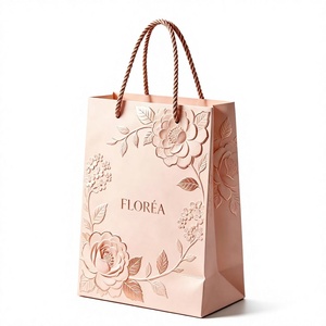 Custom Logo Luxury Pink Embossed Gift paper <b>Bags</b> Rose Gold Foil Print Tote <b>bags</b> with Rope handles - Product Image 1