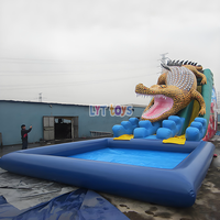 Toboggans gonflables personnalisés de grande taille en forme de crocodile à double voie, toboggan gonflable avec piscine