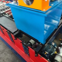 Machine de production de tôles de toiture IBR en Chine avec moteur, pompe et boîte de vitesses pour une production efficace et durable de tôles de toiture répondant aux normes de construction locales