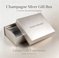 Boîte rigide personnalisée avec couvercle et base métallisés champagne, logo de marque en relief pour bijoux, montres et emballages cadeaux haut de gamme