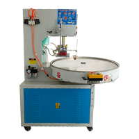 Machine de gaufrage et de soudage de semelles de chaussures à table rotative haute fréquence