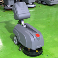 Nettoyeur de sols portatif compact et manuel, idéal pour les ateliers, les usines et l'usage commercial
