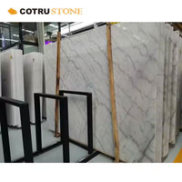Carreaux de sol en marbre blanc GuangXi Carreaux de marbre de comptoir naturel poli bon marché Alternative au marbre