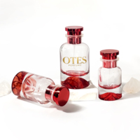 Boîte de parfum ronde au design unique Pot cosmétique en verre Bouteilles de pulvérisation en verre Bouteille d'huile essentielle Bouteille de parfum de 100ml