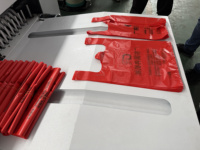 Ligne de production entièrement automatique de sacs en plastique pour t-shirts et t-shirts en nylon, machines de fabrication de sacs pour matériaux d'emballage