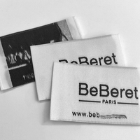 Étiquettes de col de vêtement personnalisées avec taille pour vêtements Étiquettes de taille de pli d'extrémité noire haute densité Étiquettes tissées cousues pour vêtements