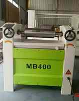 Machine à assembler les bords en bois massif Épandeur de colle pour bois laminé à double chaîne avec moteur pour bois articulé au doigt par