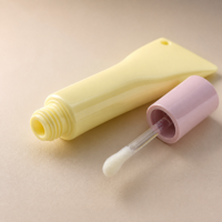 Tube de brillant à lèvres vide en forme de macaron jaune et rose avec trou pour porte-clés, flacon de gloss à lèvres compressible pour emballage de maquillage