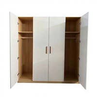 Armoire de chambre économique pour location avec placards sur mesure et rangement intégré