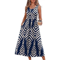 Robe midi ample sans manches à col halter, style bohème, floral, naturelle et respirante, coupe trapèze, pour femme, collection été 2026, idéale pour la plage et les vacances.