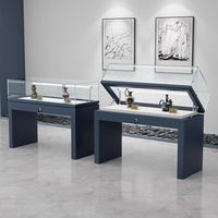 Maßgefertigte Schmuck-Vitrine Gehärtetes Explosionsgeschütztes Glas LED-Beleuchtung Oben Öffnendes Design Lackierte Oberfläche Individuelle Farbe