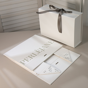 Luxury <b>White</b> Foldable Paperboard <b>Gift</b> <b>Box</b> with Magnetic Closure Matt Lamination Embossing Hand Knot Satin Ribbon Packaging - Product Image 1