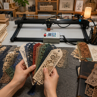 Machine de découpe laser CNC pour l'art papier complexe et les fleurs en papier, graveur laser de bureau pour les entreprises de création en papier