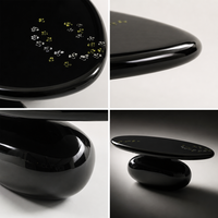 Table basse ovale en métal noir brillant à motif floral artistique moderne avec options de couleur et de taille personnalisées