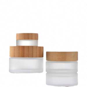 Venta Caliente: Frascos de Vidrio Esmerilado Transparente de Alta Calidad para Cosméticos, 50g/100g, con Tapas de Bambú para Crema Facial y Contorno de Ojos - Product Image 1