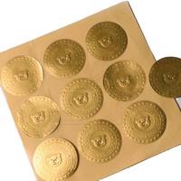 Autocollant de logo en métal personnalisé métallisé or étiquette adhésive de parfum en relief en feuille d'or pour bouteille de vin
