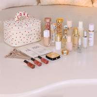 Mini trousse de maquillage en forme de cœur pour femme, sac de rangement mignon pour maquillage, trousse de toilette portable de grande capacité pour voyage