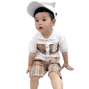 Conjunto de ropa informal para niños, camiseta de manga corta y pantalones cortos con rejilla, 2023