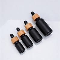 Flacons compte-gouttes en verre noir premium 15ml 30ml 50ml 100ml avec bouchons en bambou pour huiles essentielles