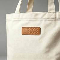 Étiquette personnalisée en cuir PU écologique thermocollée pour jeans, sacs, accessoires de vêtements à coudre, vente en gros OEM