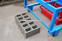 Machine à fabriquer des blocs creux QM4-45, pavé de route, machine à fabriquer des briques, pose de blocs en Roumanie