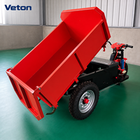 Chariot à plateforme à trois roues alimenté par batterie avec structure en acier pour le transport industriel et la manutention de matériaux