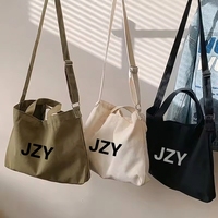 Bolso de lona para mujer, bandolera con estampado de letras estéticas, correa ajustable, gran capacidad, de algodón, para la escuela y compras