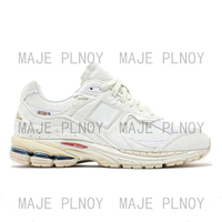 2002R Chaussures Athlétiques de Luxe Décontractées pour Hommes Triple S Protection Pack Rose Rain Cloud Designer Nouvelles Baskets 2002R Chaussures pour Homme