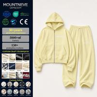 Conjunto de 2 piezas para hombre: Sudadera con capucha extragrande con cremallera completa y puños acanalados, y pantalones de chándal de pierna ancha con cordón. Ropa de descanso y chándal. Logotipo personalizado OEM.