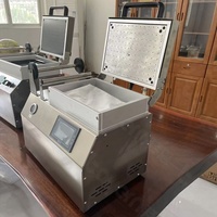 Machine automatique d'emballage de peau sous vide machine à sceller les plateaux de restauration rapide machine d'emballage sous vide de viande fraîche pack de peau de poisson