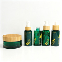 Ensemble d'emballages cosmétiques en verre vert rechargeables zéro déchet avec couvercle en bambou véritable, vente en gros, capacité personnalisée, marque de beauté écoresponsable