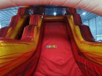 Toboggan aquatique commercial KUOYE d'été en forme de dinosaure, toboggan aquatique gonflable avec piscine amovible pour la location événementielle