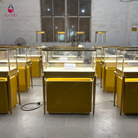 Comptoir de présentation de bijoux en verre de luxe Sundo, cadre en acier inoxydable, éclairage LED, miroir arrière, étanche, verrouillable