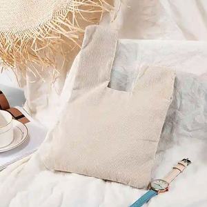 Pochette en velours côtelé de coton en tissu japonais portable et réutilisable en couleur vente en gros sac de poignet à nœud - Product Image 6