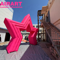 Arche gonflable étoile rose pour événements publicitaires et décorations. Arche gonflable étoile personnalisée pour événements en extérieur.