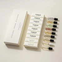 Boîte cadeau de luxe avec logo personnalisé en feuille d'or, vernis UV sélectif, finition mate, taille sur mesure pour coffret découverte de parfums