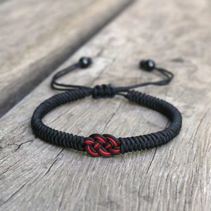 Pulsera de cuerda trenzada roja y negra con doble nudo de moneda, regalo para pareja, diseño tejido, origen Yiwu, invierno 2023 - Product Image 1