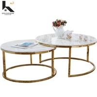 Table basse moderne de luxe en marbre avec pieds en acier inoxydable, mobilier design pour villas