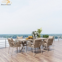Mobilier moderne d'extérieur pour restaurant Cadre en aluminium tissé avec corde Table à manger de luxe pour jardin Ensemble 6 places