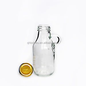 Bouteille de jus de lait en verre gaufré vintage transparent de 250ml avec petite poignée et ligne d'échelle - Product Image 4